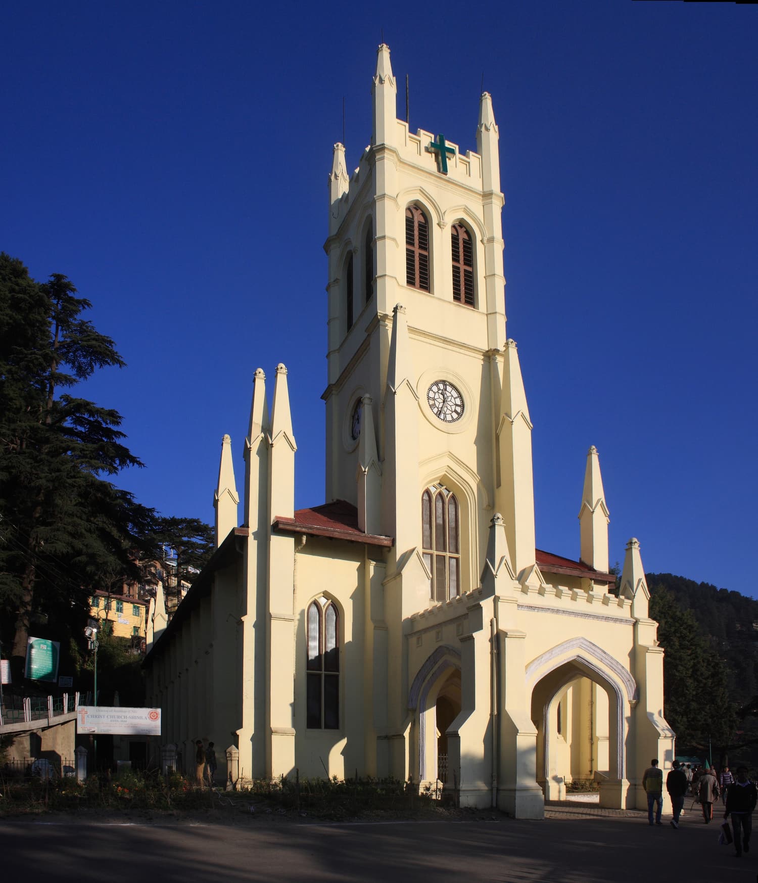 The neo-Gothic tower of Christ Church in Shimla against a deep blue sky