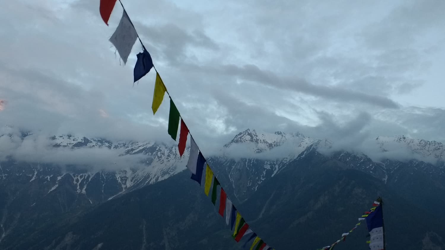 The Kinnaur Kailash range seen from Kalpa with prayer flags in the foreground