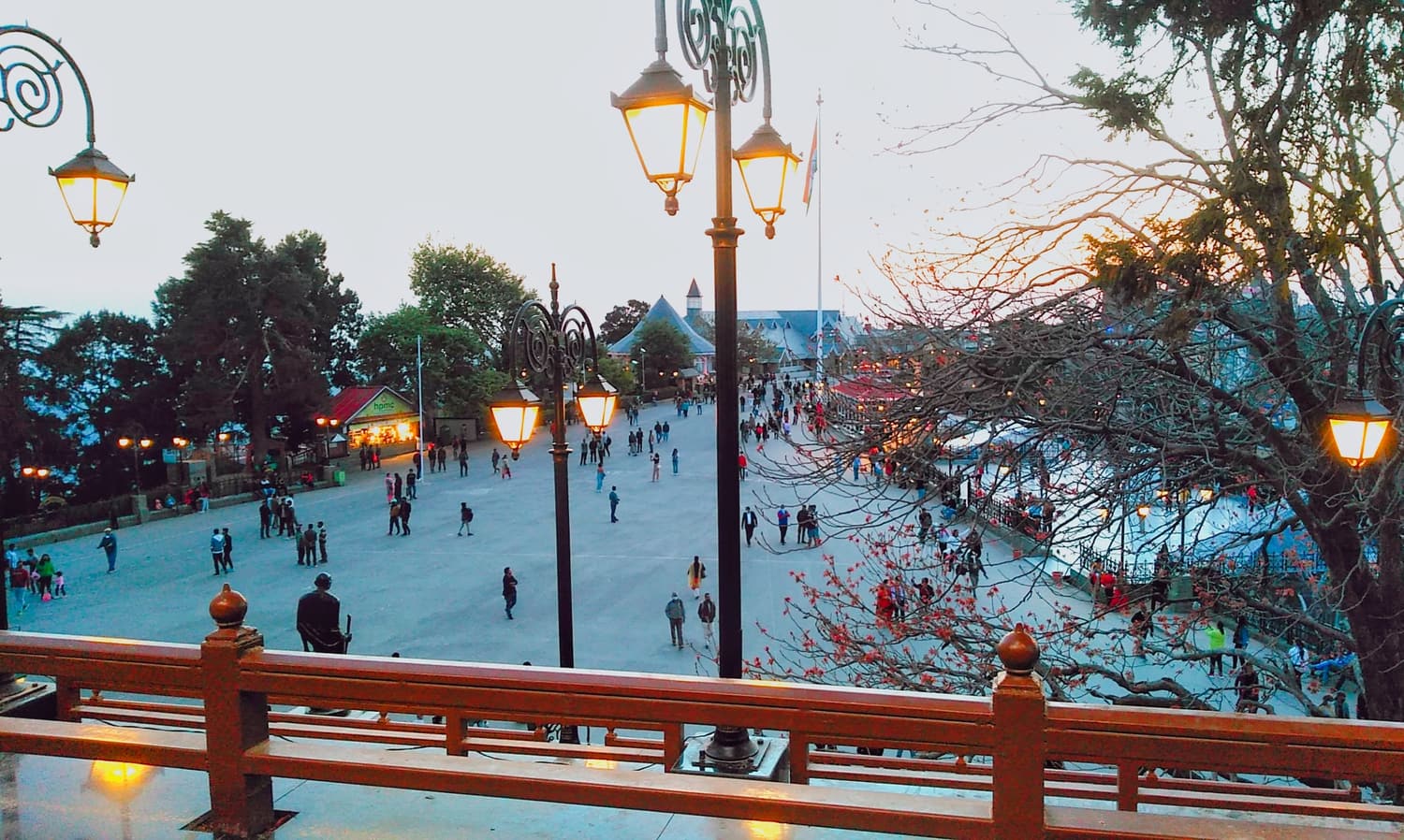 The Ridge in Shimla with its lamp posts, benches and the town spread over the hillside