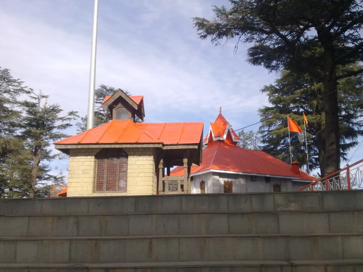 The Jakhoo Temple buildings among deodar trees on the summit of Jakhoo Hill